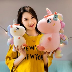 Peluche Unicorno seduto in varie dimensioni e colori (25-60cm)