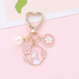 Portachiavi Giapponese - Coniglio su cerchio fiorato con moschettone Cuore - perla e sakura